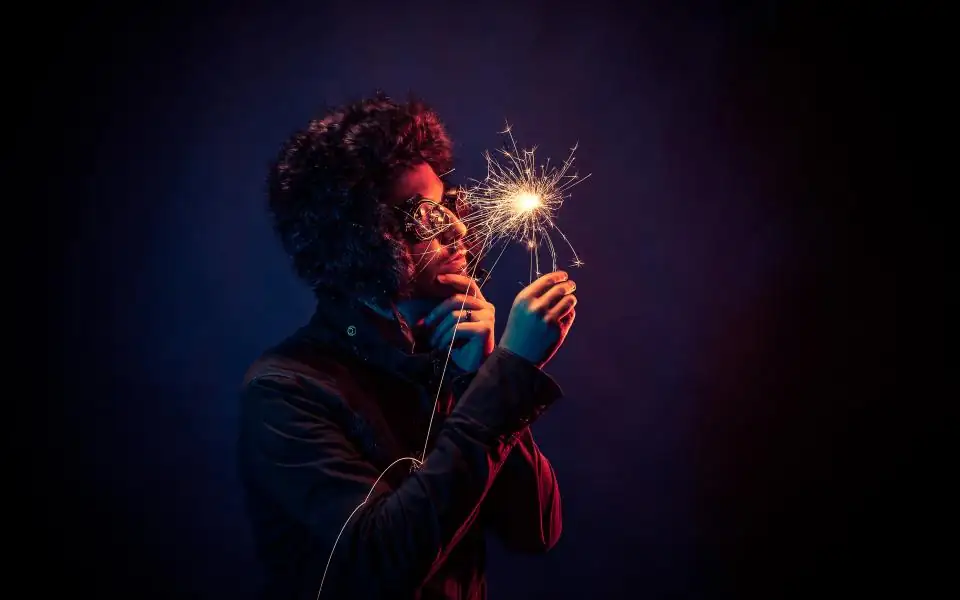 Player celebrating with a sparkler, representing 218PLUSPH promotions